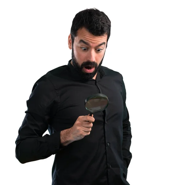 Homem Bonito Com Barba Com Lupa Sobre Fundo Branco — Fotografia de Stock