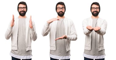 Bir şey tutan Hipster adam kümesi