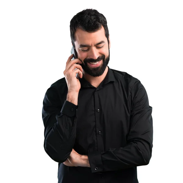 Beyaz Arka Plan Üzerinde Konuşmak Için Telefon Sakallı Yakışıklı Adam — Stok fotoğraf