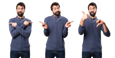 Şüpheleri Laterallerin işaret eden sakallı yakışıklı esmer adam ayarla