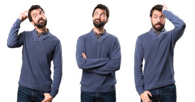 Şüpheleri sakallı yakışıklı esmer adam kümesi