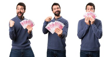 Bir sürü para alarak sakal ile mutlu yakışıklı esmer adam ayarla