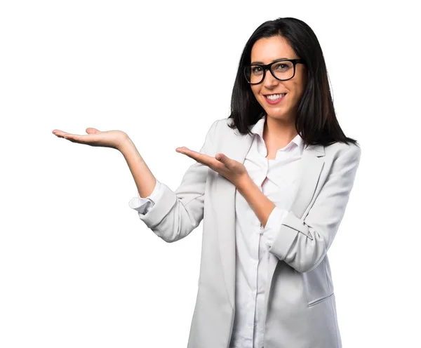 Pretty Woman Glasses Presenting Something White Background — Stock Photo, Image