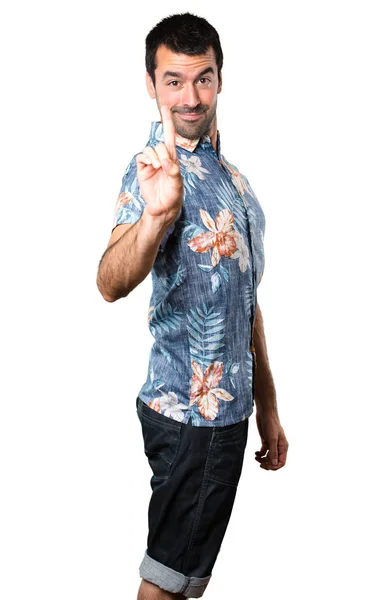 Knappe Man Met Bloem Shirt Tellen Een Zichzelf Staande Witte — Stockfoto