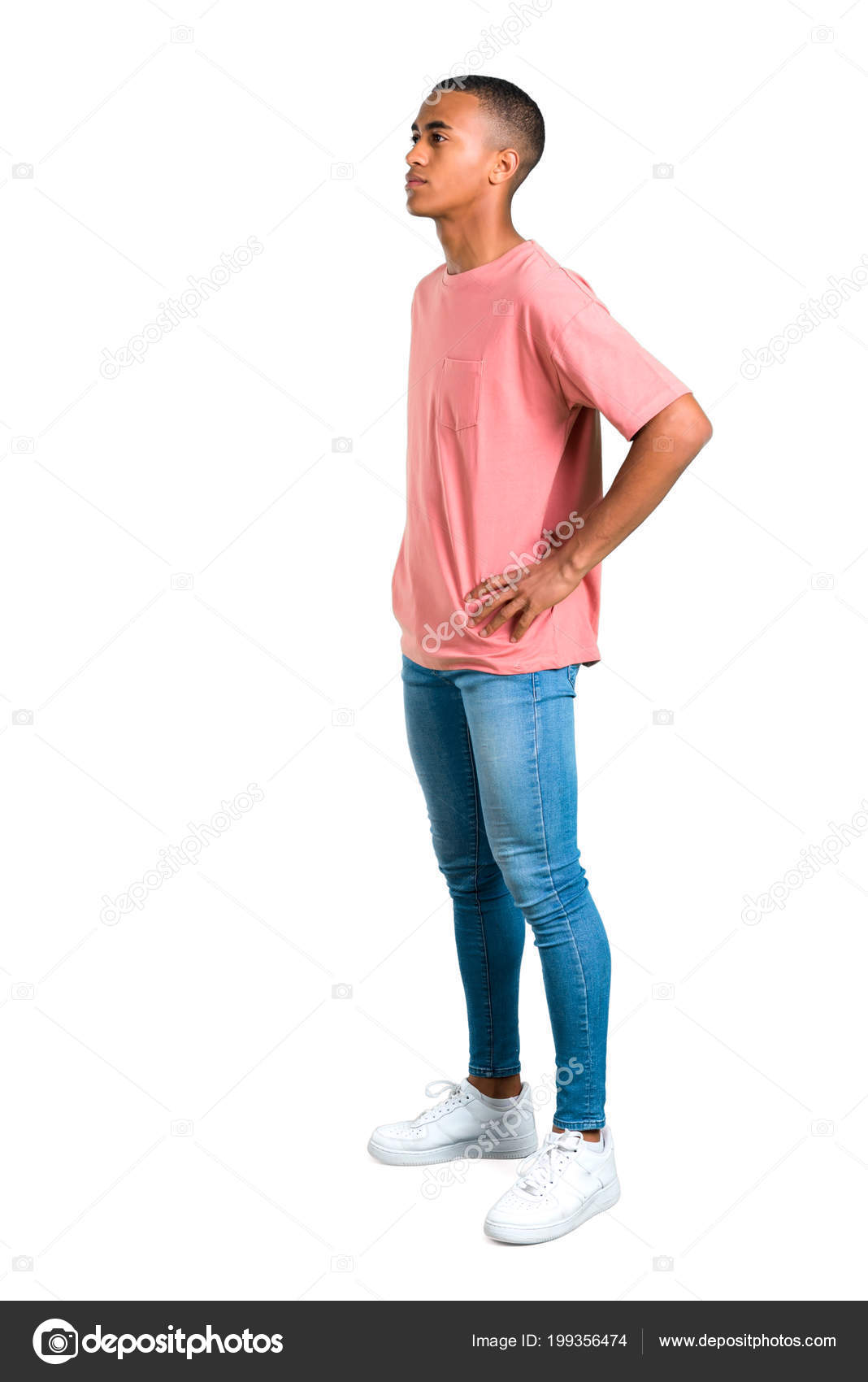 Standing Young African American Man Standing Looking Side Isolated White  Stock Photo by ©luismolinero 199356474