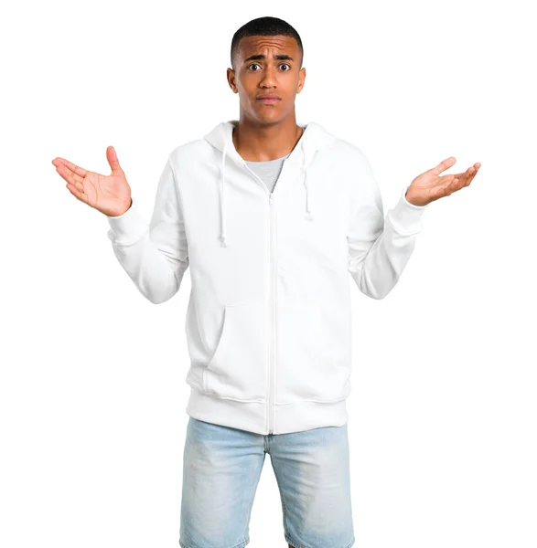 Donkere Jongeman Met Witte Sweatshirt Twijfels Confuse Gezicht Expressie Terwijl — Stockfoto
