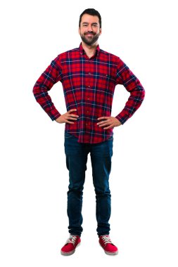 Yakışıklı adam silah, kalça ile poz