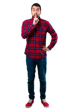 Yakışıklı adam ağız ve sessizlik bir jest kapanış bir işaret gösteren