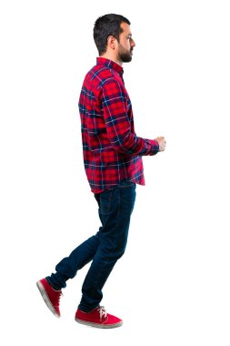 Yürüyen yakışıklı adam. Hareket jest.