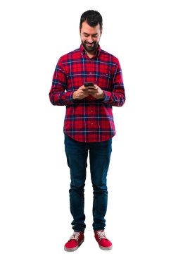 Cep telefonu kullaranarak yakışıklı adam