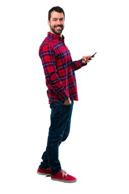 Cep telefonu kullaranarak yakışıklı adam