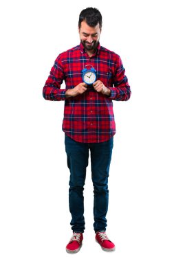 Yakışıklı adam Vintage çalar saat tutan