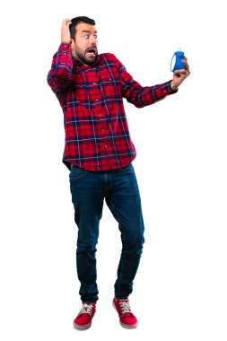 Yakışıklı adam Vintage çalar saat tutan