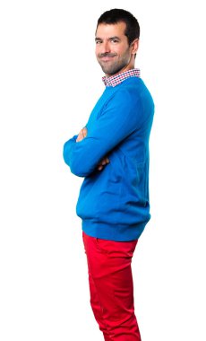 Yakışıklı genç adam kollarını ile beyaz arka plan üzerinde çarpı işareti