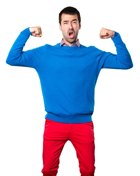 Guapo Joven Haciendo Fuerte Gesto Sobre Fondo Blanco — Foto de Stock