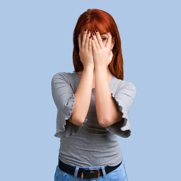 Young Redhead Girl Covering Eyes Hands Blue Background — Stock Photo, Image