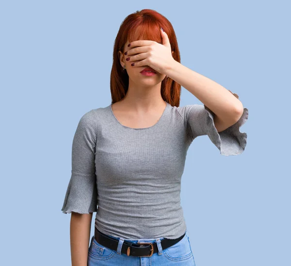 Young Redhead Girl Covering Eyes Hands Blue Background — Stock Photo, Image