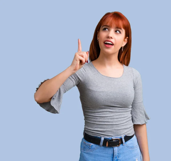 Young Redhead Girl Intending Realizes Solution Blue Background — Stock Photo, Image