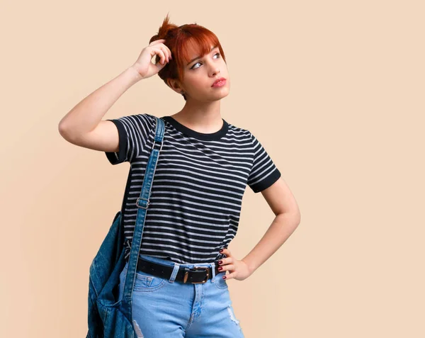 Young Student Redhead Girl Having Doubts Confuse Face Expression Ocher — Stock Photo, Image