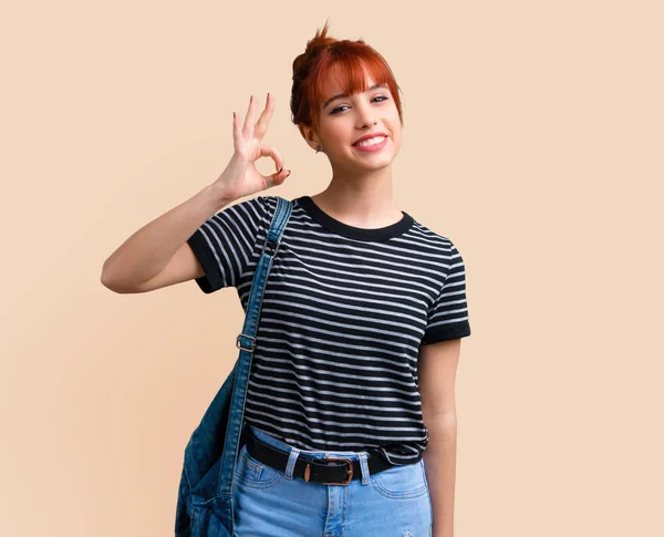 Young Student Redhead Girl Showing Sign Fingers Ocher Background — Stock Photo, Image