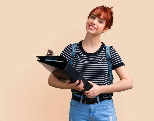 Young Student Redhead Girl Folder Ocher Background — Stock Photo, Image