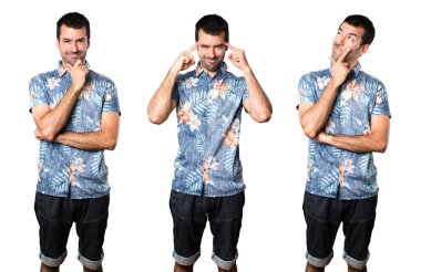 Çiçek gömlek düşünce ile yakışıklı adamın ayarla