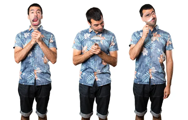 Büyüteç ile çiçek forması ile yakışıklı adamın ayarla