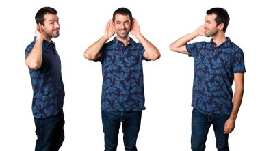 Esmer adam bir şey dinlerken kümesi