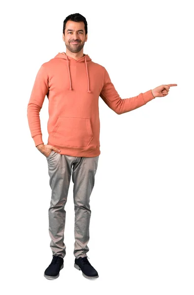 Full Body Man Pink Sweatshirt Pointing Finger Side Presenting Product — Stock Photo, Image