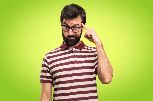 Homme Avec Des Lunettes Penser Sur Fond Coloré — Photo