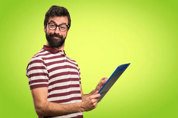 Hombre Feliz Con Gafas Con Carpeta Sobre Fondo Colorido —  Fotos de Stock