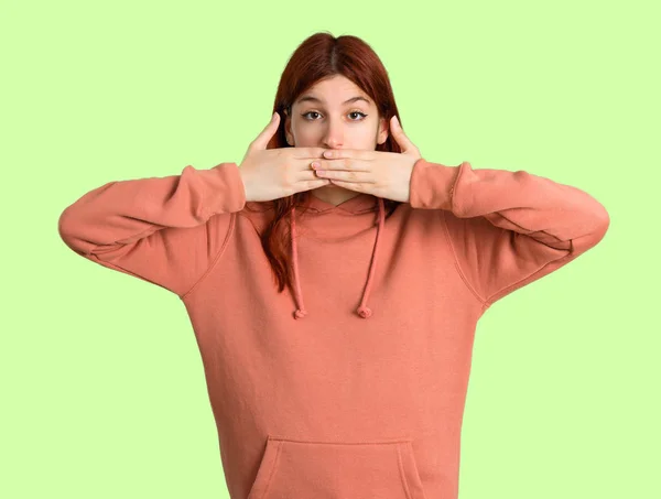 Young Redhead Girl Pink Sweatshirt Covering Mouth Hands Saying Something — Stock Photo, Image