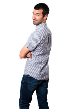 Yakışıklı adam kollarını ile izole beyaz arka plan üzerinde çarpı işareti