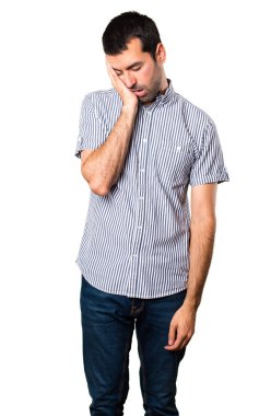 Yakışıklı adam uyku jest yapma beyaz arka plan izole