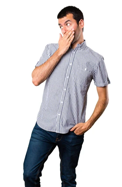 Yakışıklı adam ağzını izole beyaz zemin üzerine kaplama