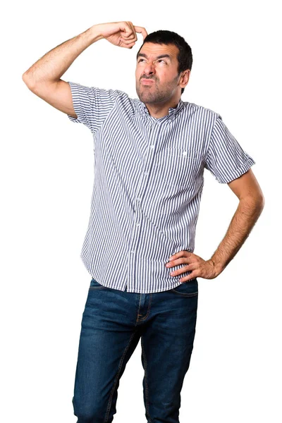 Yakışıklı adam izole beyaz zemin üzerine şüpheleri