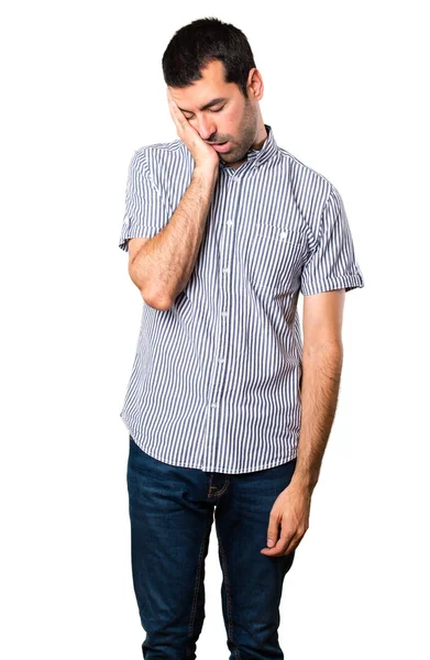 Yakışıklı adam uyku jest yapma beyaz arka plan izole