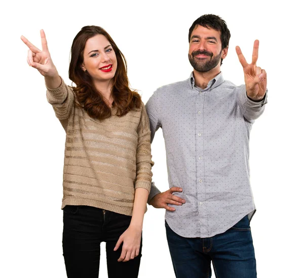 Young Couple Making Victory Gesture — Stock Photo, Image