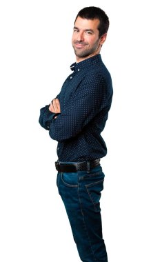 Yakışıklı adam kollarını ile izole beyaz arka plan üzerinde çarpı işareti