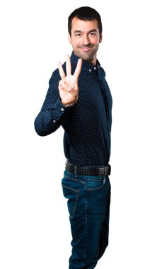 Yakışıklı adam üç izole beyaz zemin üzerine sayma