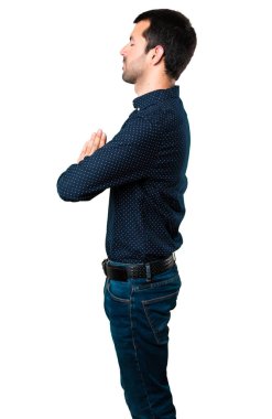 Yakışıklı adam izole beyaz arka plan üzerinde yalvaran