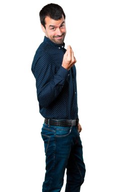 Yakışıklı adam para jest yapma beyaz arka plan izole