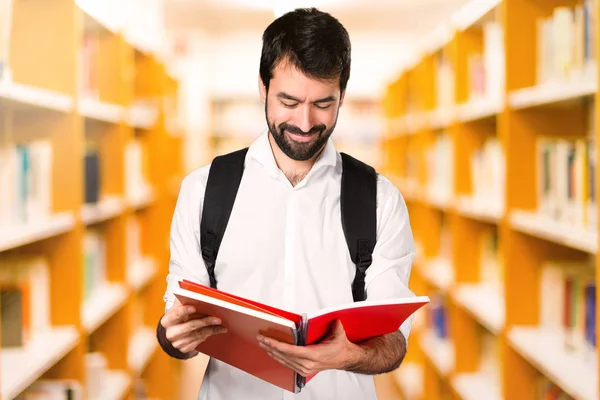 Student Mit Notizbüchern Defokussierter Bibliothek — Stockfoto