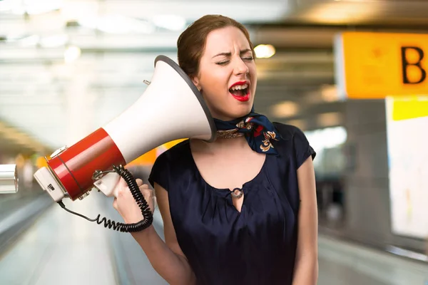 Pretty Stewardess Holding Megaphone Airport Royalty Free Stock Photos