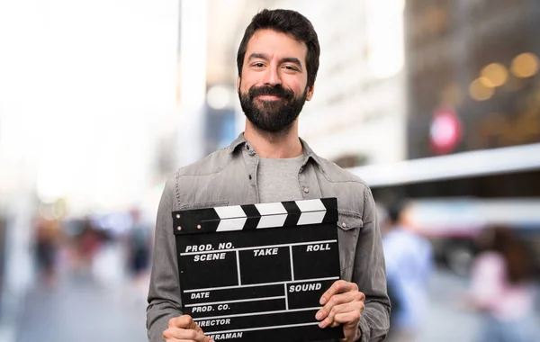 Handsome Man Beard Holding Clapperboard Outdoor — Stock Photo, Image