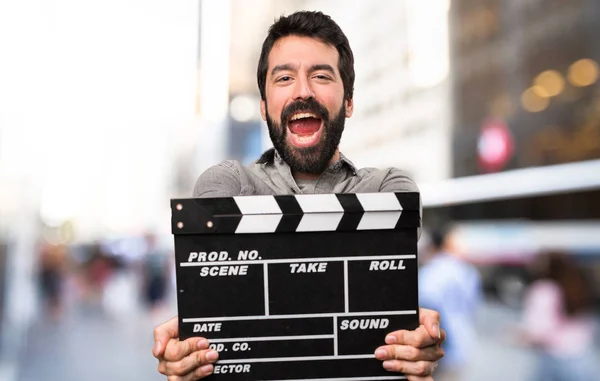 Handsome Man Beard Holding Clapperboard Outdoor — Stock Photo, Image