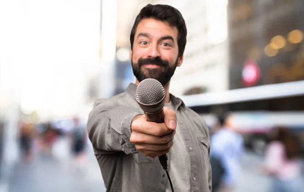 Handsome Man Beard Singing Microphone Outdoor — Stock Photo, Image