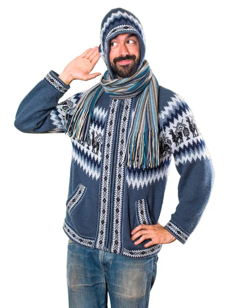 Mann Winterkleidung Hört Etwas — Stockfoto