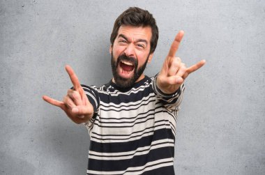 Boynuz jest yapma sakallı dokulu arka plan