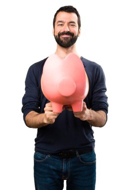 Bir servet tutan sakallı yakışıklı adam